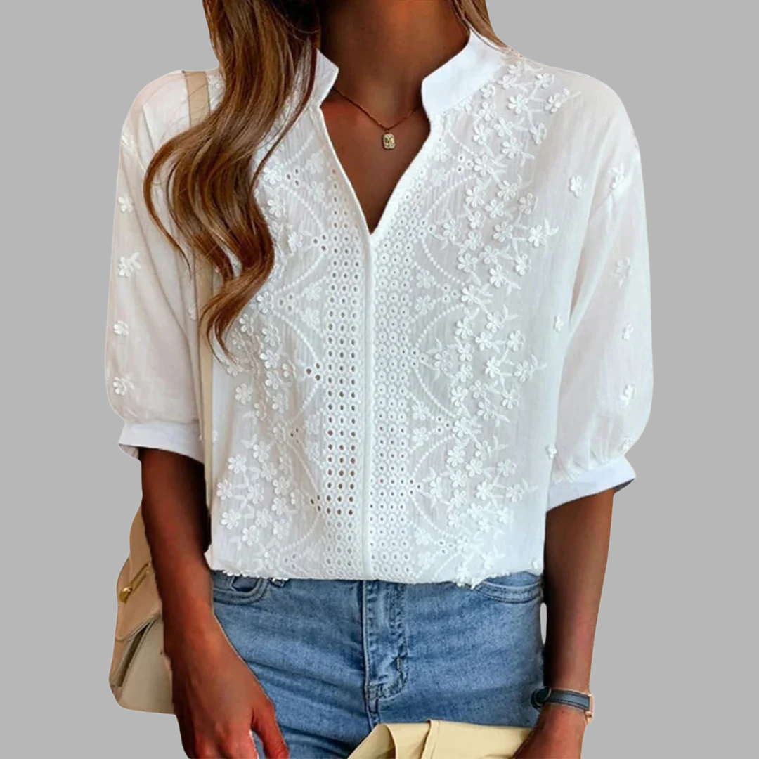 Unni | Elegant vit blus med puffärmar