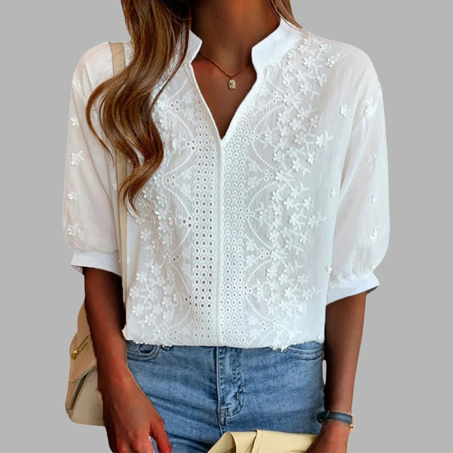 Unni | Elegant vit blus med puffärmar