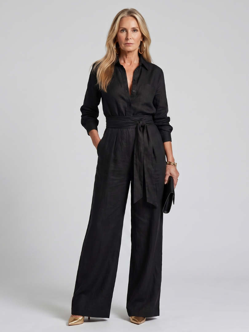 Jovie | Långärmad jumpsuit med knapplist och vida ben