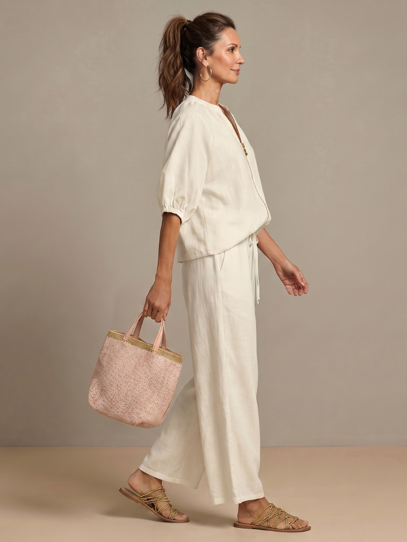 Natalia | Blus med dragkedja och vida byxor