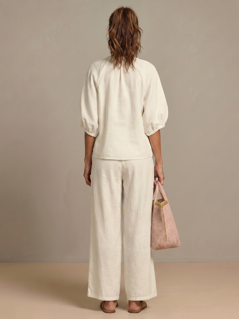 Natalia | Blus med dragkedja och vida byxor