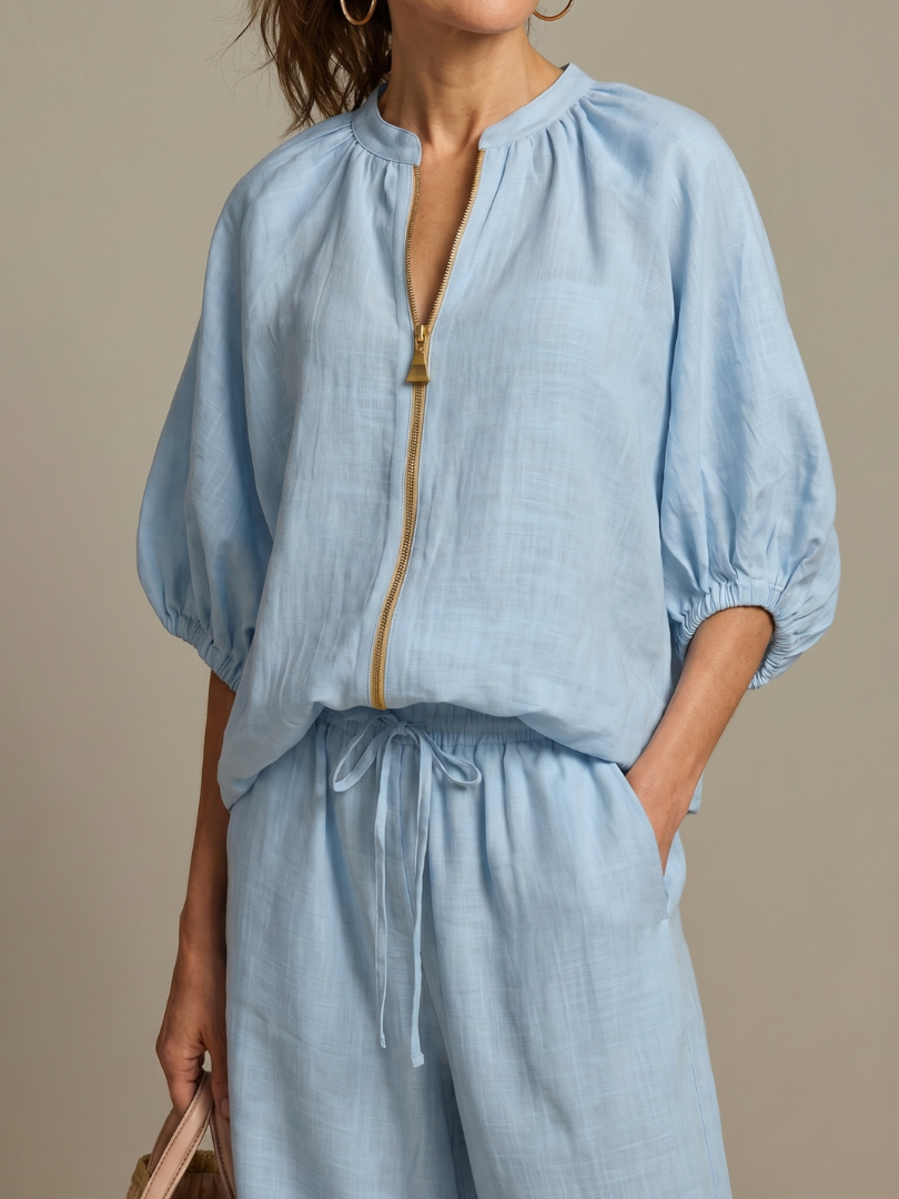Natalia | Blus med dragkedja och vida byxor