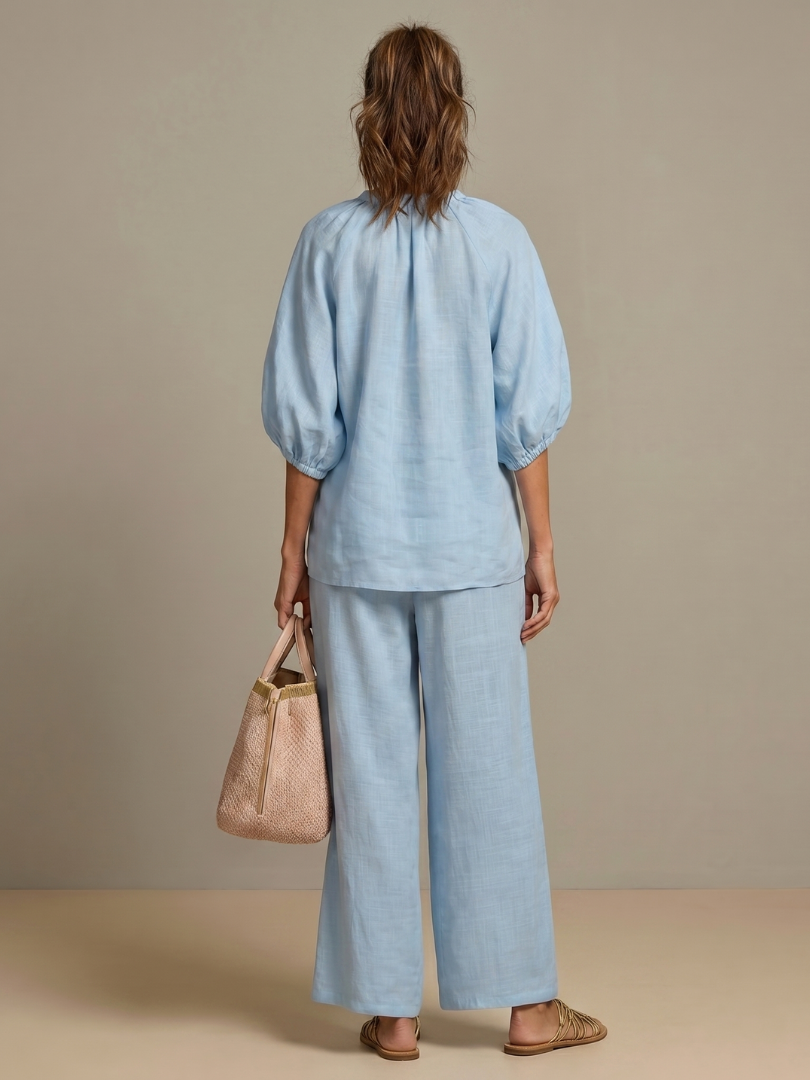 Natalia | Blus med dragkedja och vida byxor