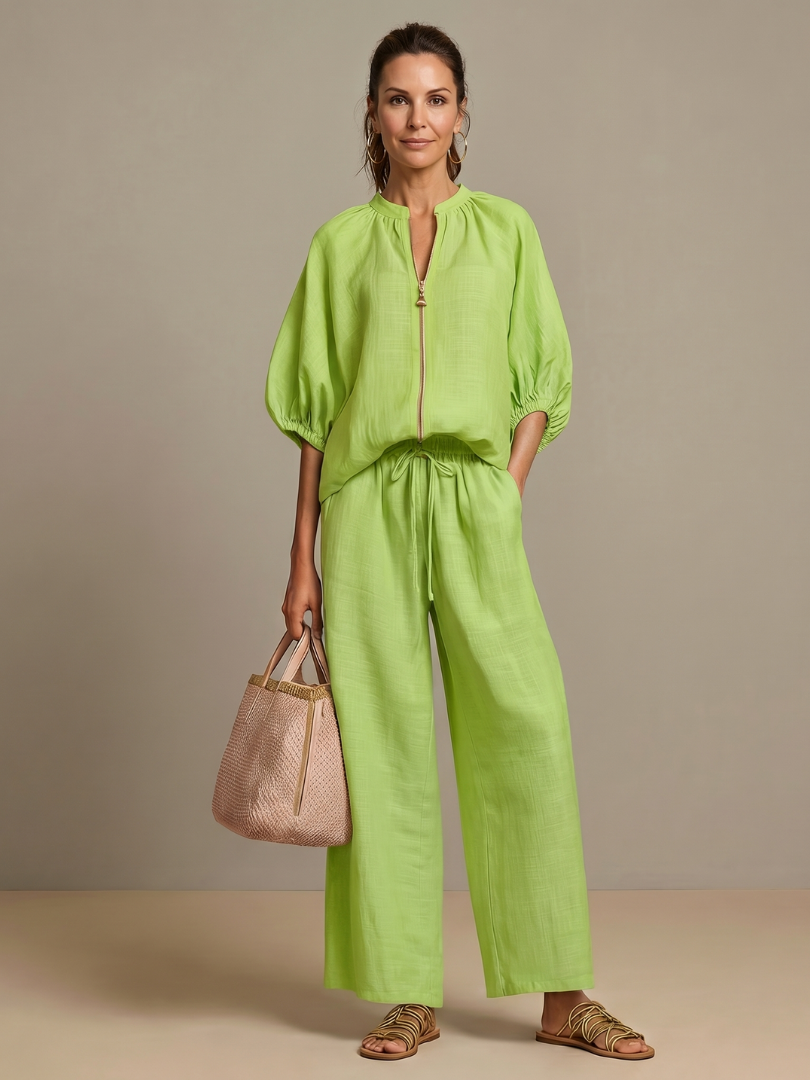 Natalia | Blus med dragkedja och vida byxor