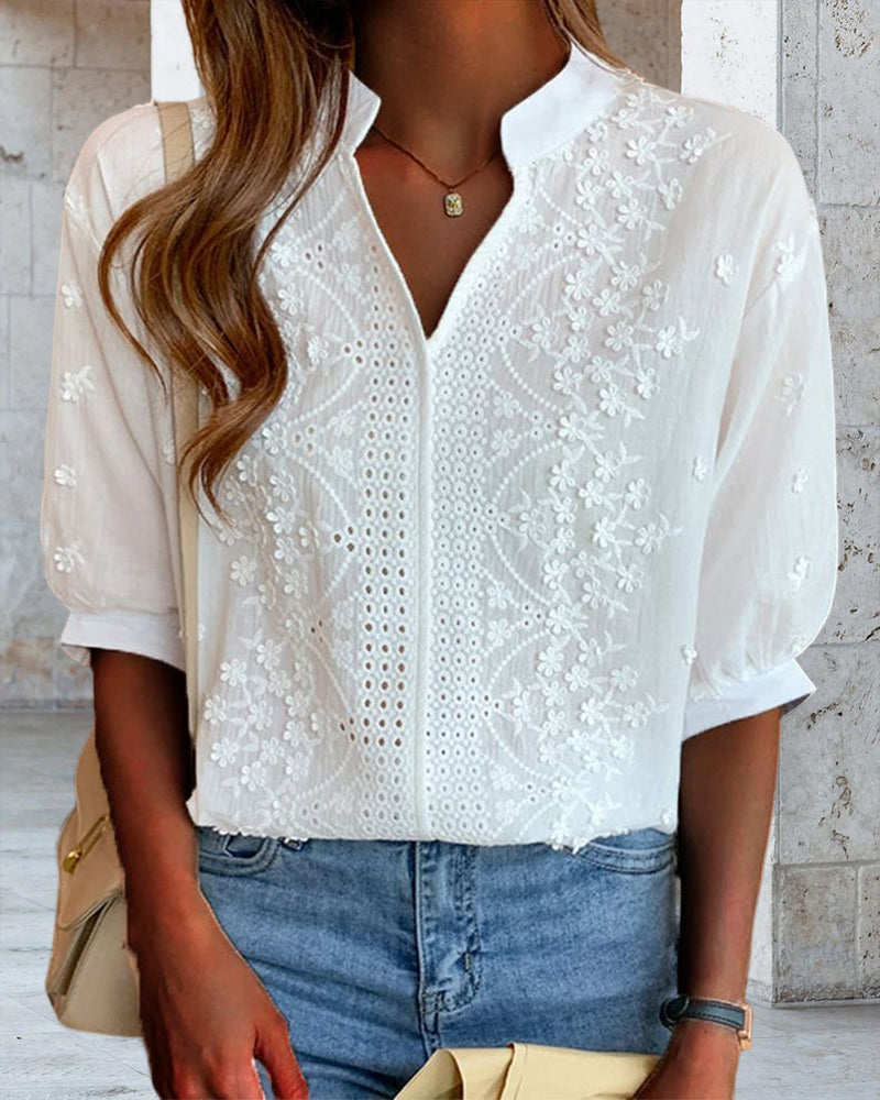 Unni | Elegant vit blus med puffärmar